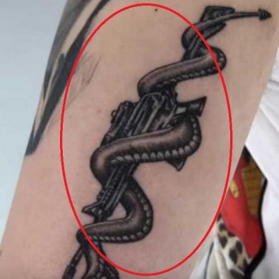 ‘Gun With A Snake’ Tattoo