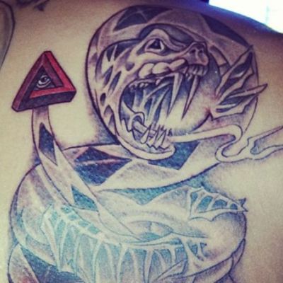 Chris Brown ‘The Snake and the All-seeing Eye’ Tattoo